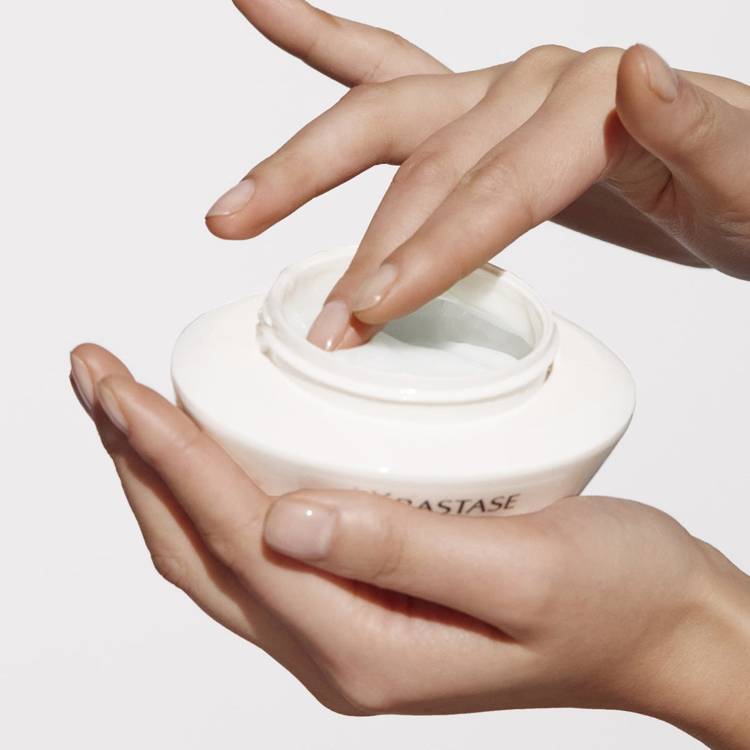 Kerastase Nutritive Masqueintense Riche Hair Mask in hand