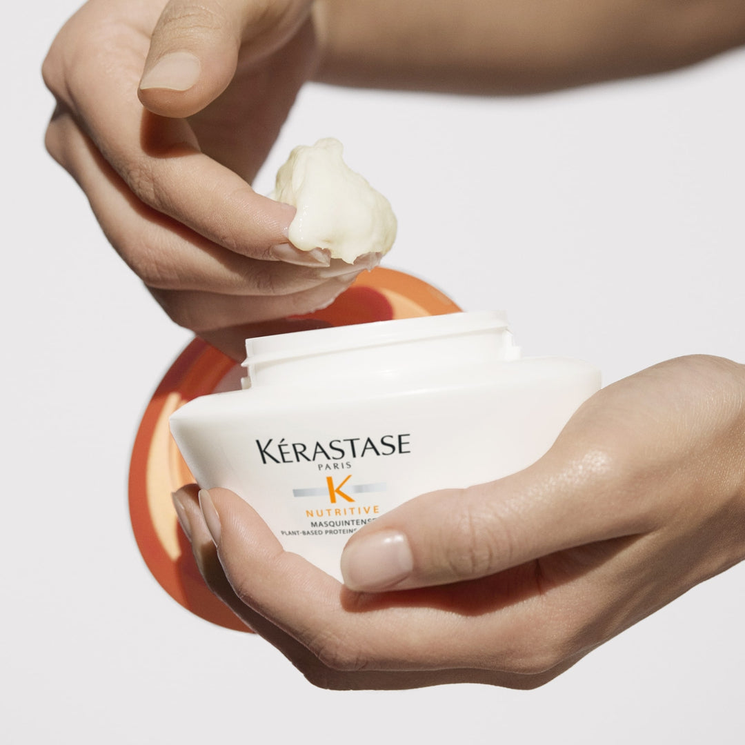Kerastase Nutritive Masquintense Hair Mask in hand