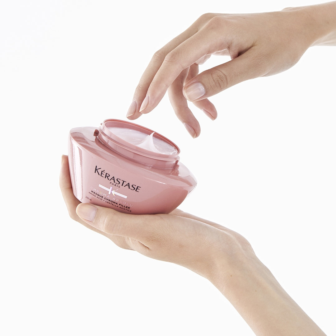 kerastase chroma absolu chroma filler hair mask product in hand