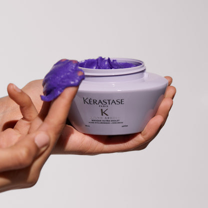 Kerastase Blond Absolu Cool-Tone Brightenting & Hydrating Hair Set in hand