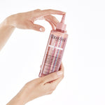 kerastase chroma absolu soin acide chroma gloss hair gloss product in hand