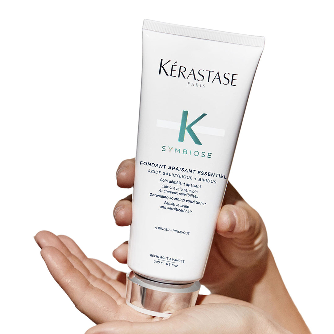 Kerastase Fondant Apaisant Essentiel Hydrating Conditioner in hand