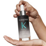 Kerastase Serum Nuit Antipelliculaire Antidandruff Night Serum in hand