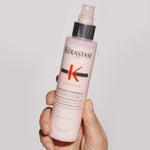 kerastase genesis defense thermique blow dry primer roduct in hand