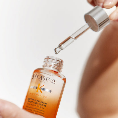 Kerastase Nutritive Nutri Supplement Split-Ends Serum in hand