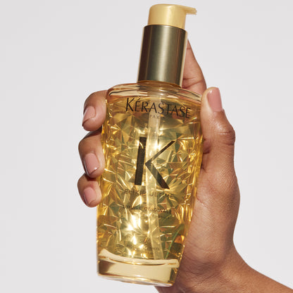 Kerastase Elixir Ultime L'Huile Original Hair Oil in hand