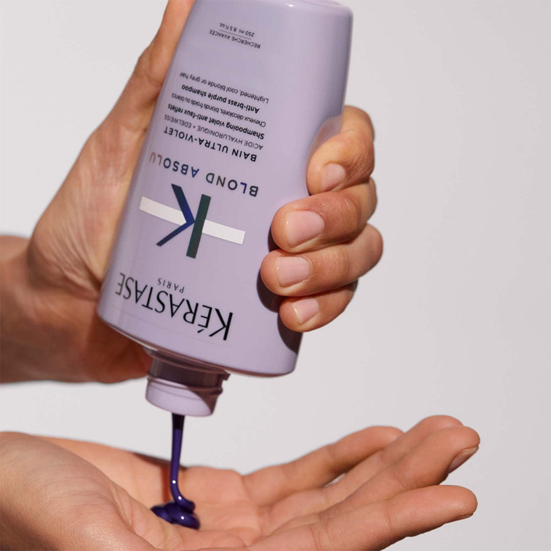 kerastase blond absolu bain ultra violet purple shampoo product in hand