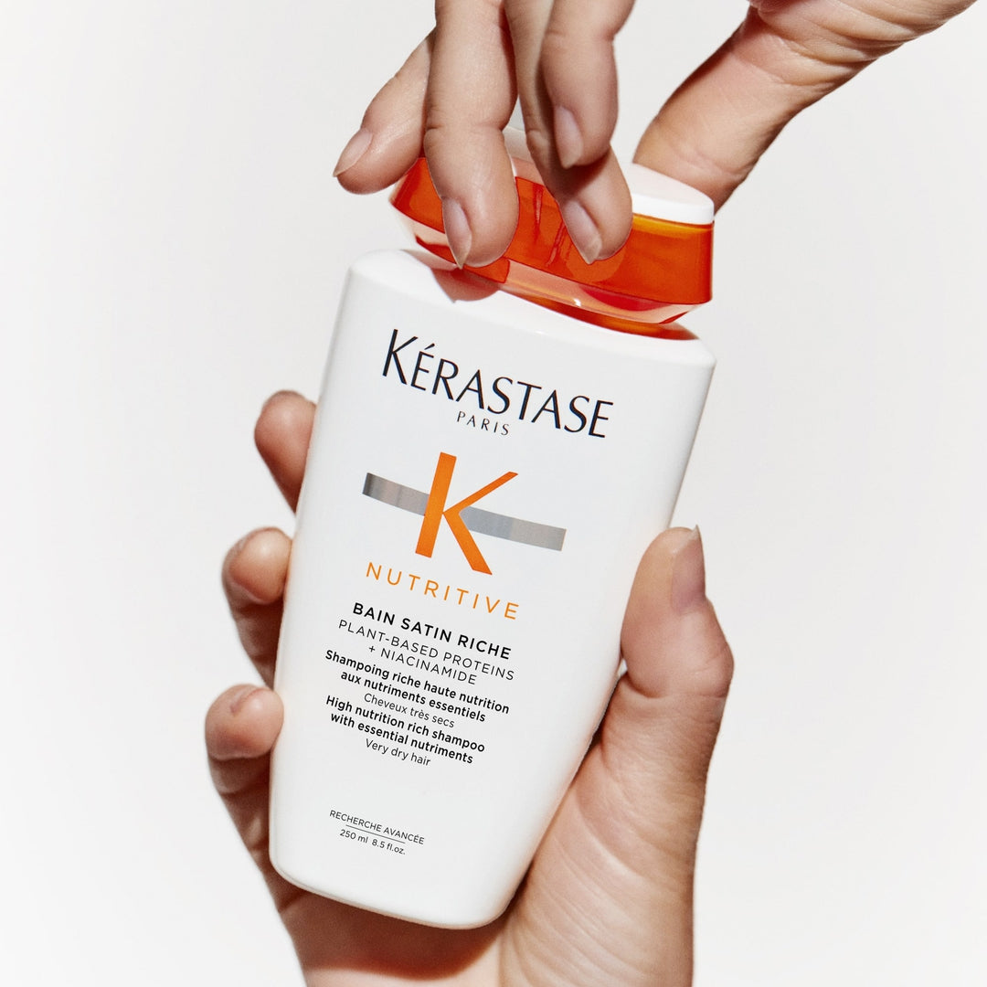 Kerastase Nutritive Bain Satin Riche Shampoo in hand