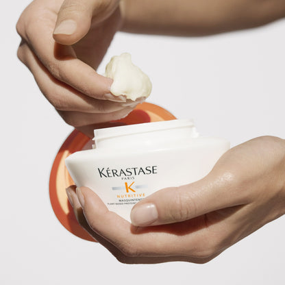Kerastase Nutritive Masquintense Hair Mask in hand