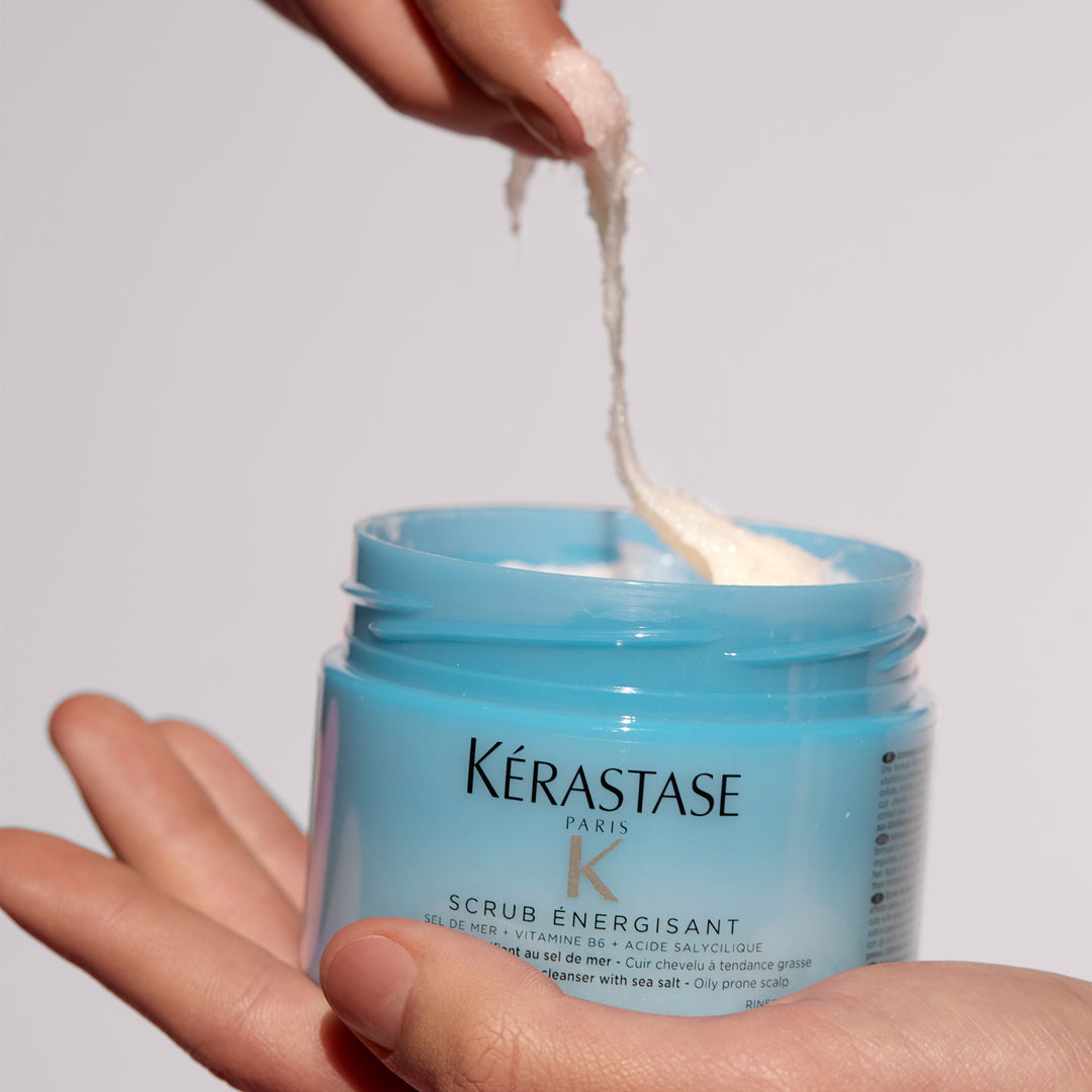Kerastase Fusio Scrubs Scrub Energisant Purifying Scalp Scrub product in hand