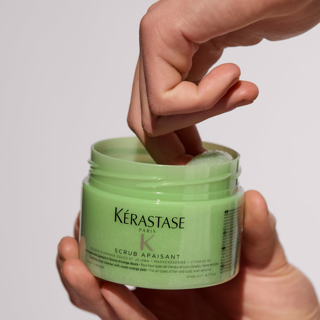 Kerastase Fusio Scrubs Scrub Apaisant Soothing Scalp Scrub product in hand