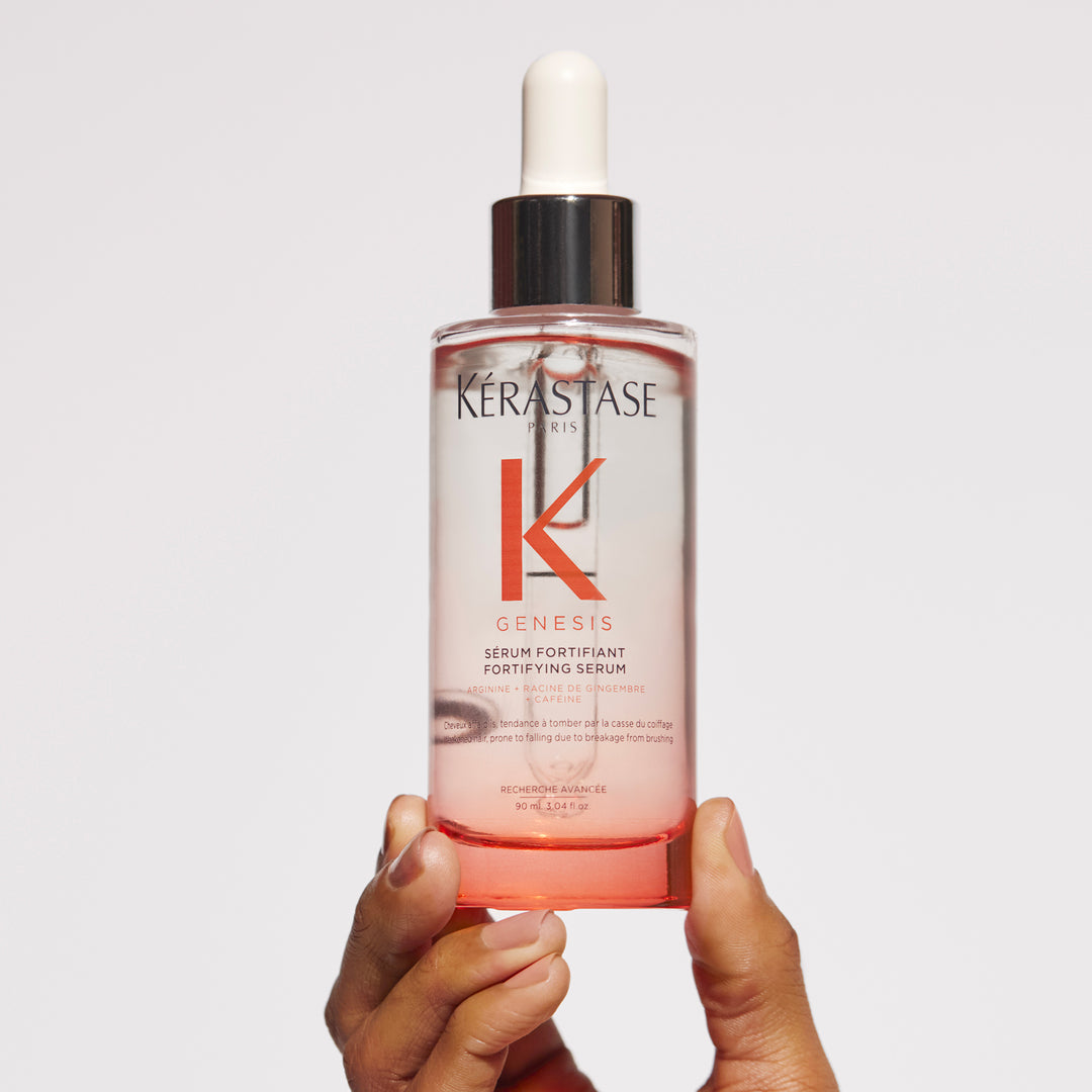 kerastase genesis serum fortifiant hair serum product in hand