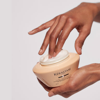 Kerastase Curl Manifesto Masque Beurre Haute Nutrition Hair Mask in hand